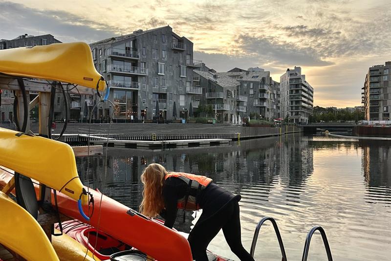 Girl preparing a kayak