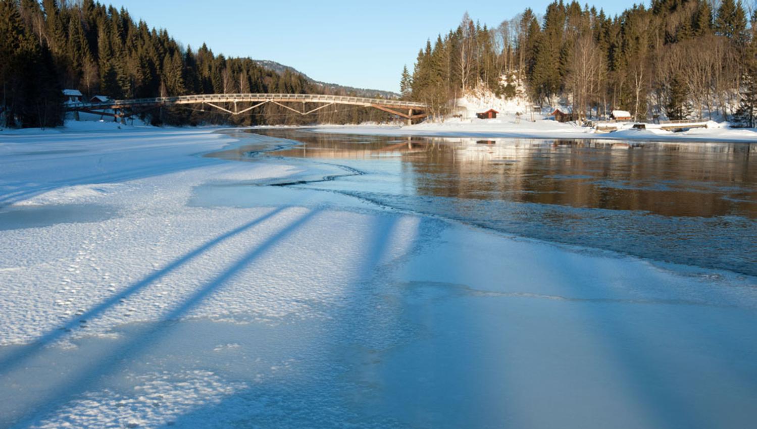 The river in winter, where there is ice on it