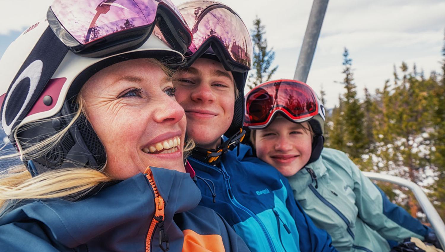 mother with child in the ski lift at Gausta ski center