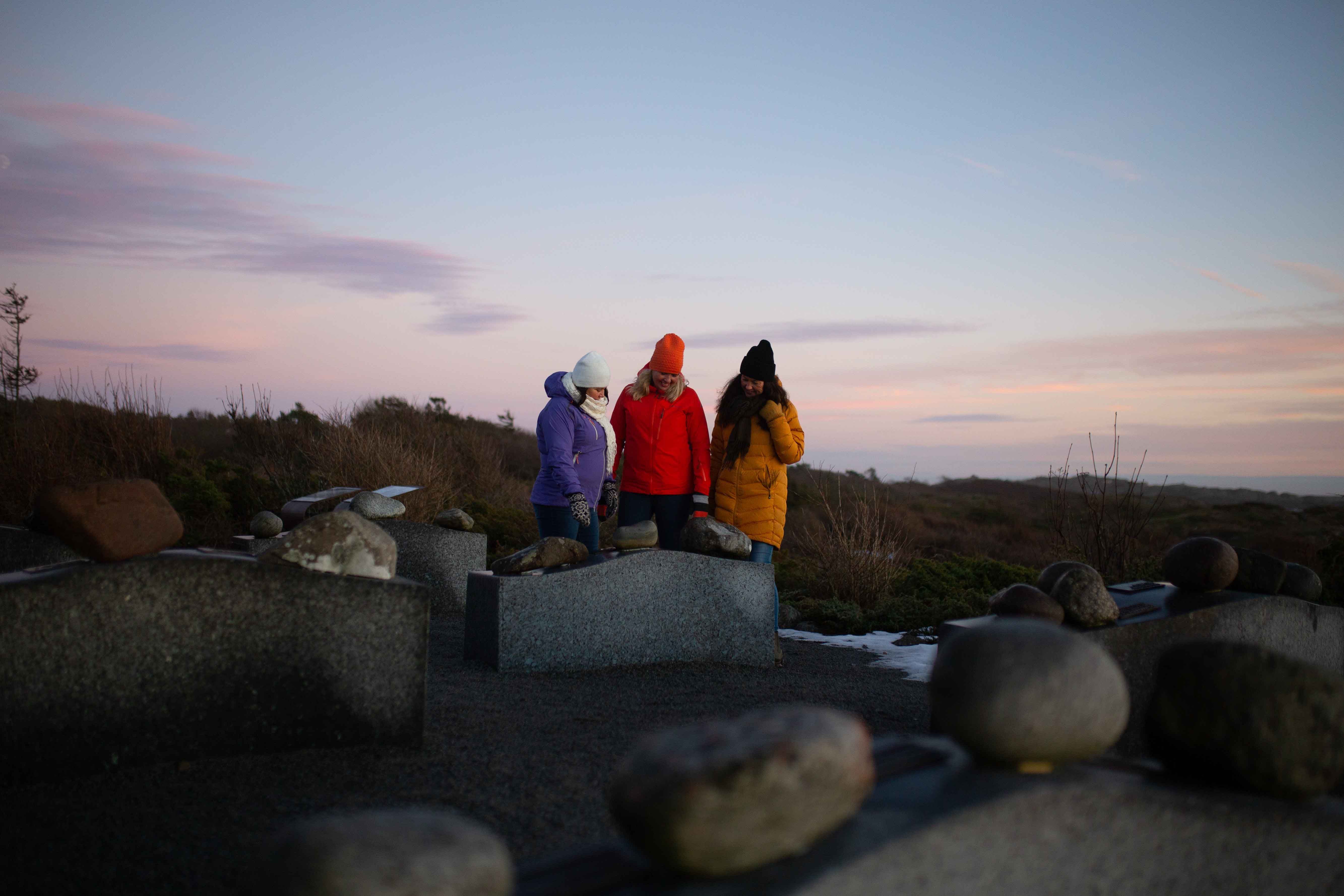 People looking at different rock types