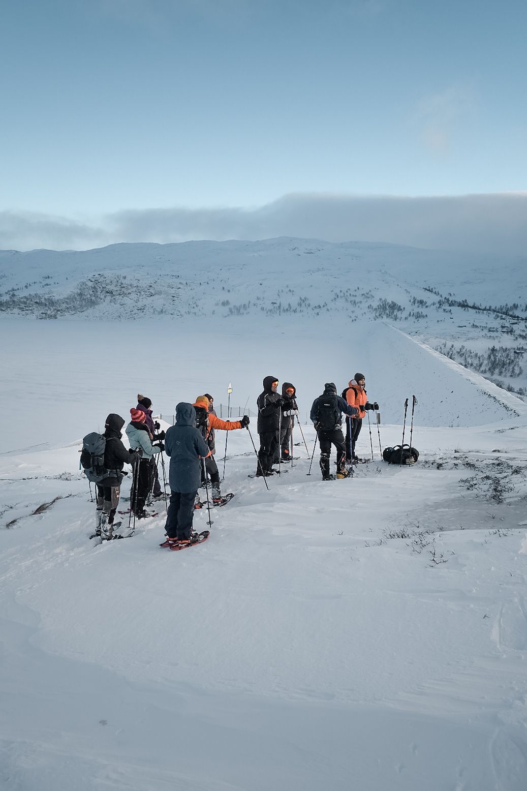 Break with the snowshoe group, enjoying the view over Hardanger.