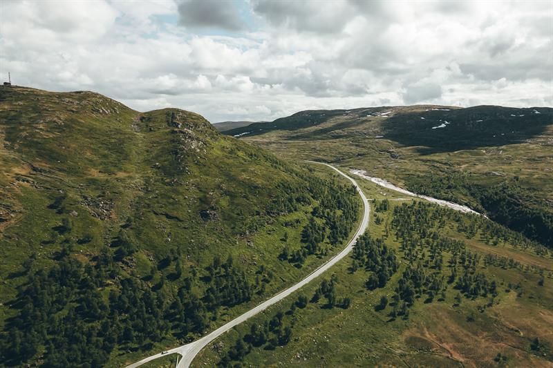 A drone shot of the access road to the dam.