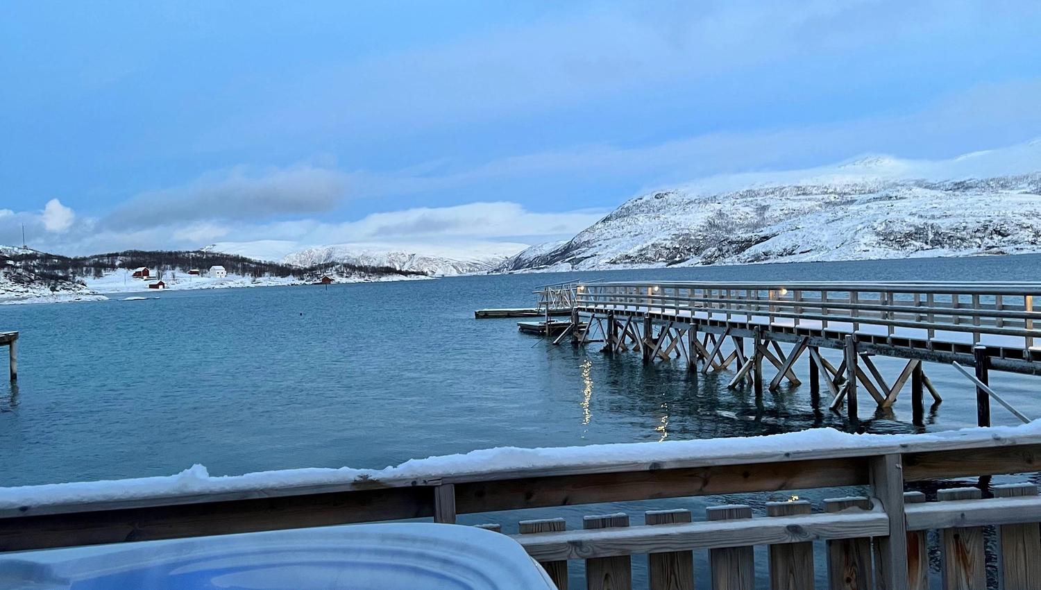 Jaquzzi during winter with views of the fjord and mountains