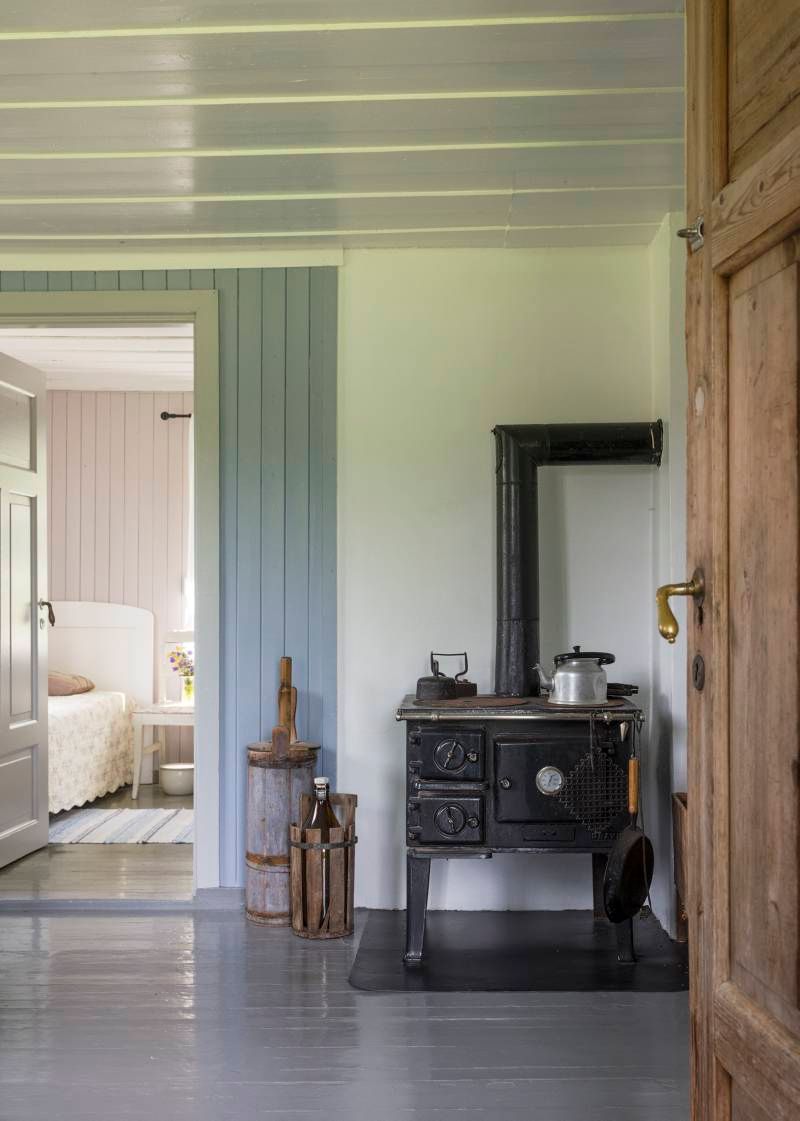 a room with an old wood stove