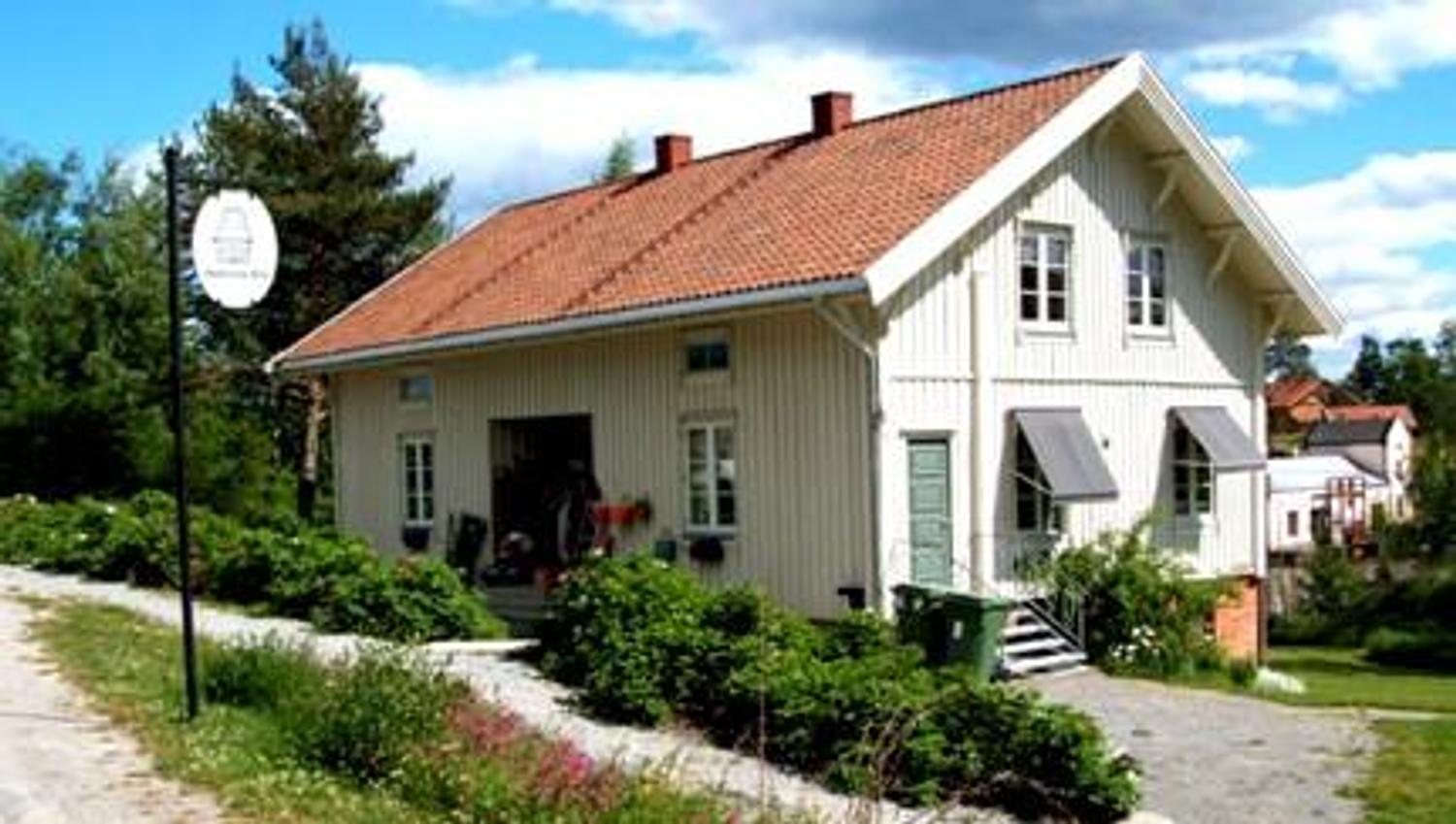The house from the outside, white