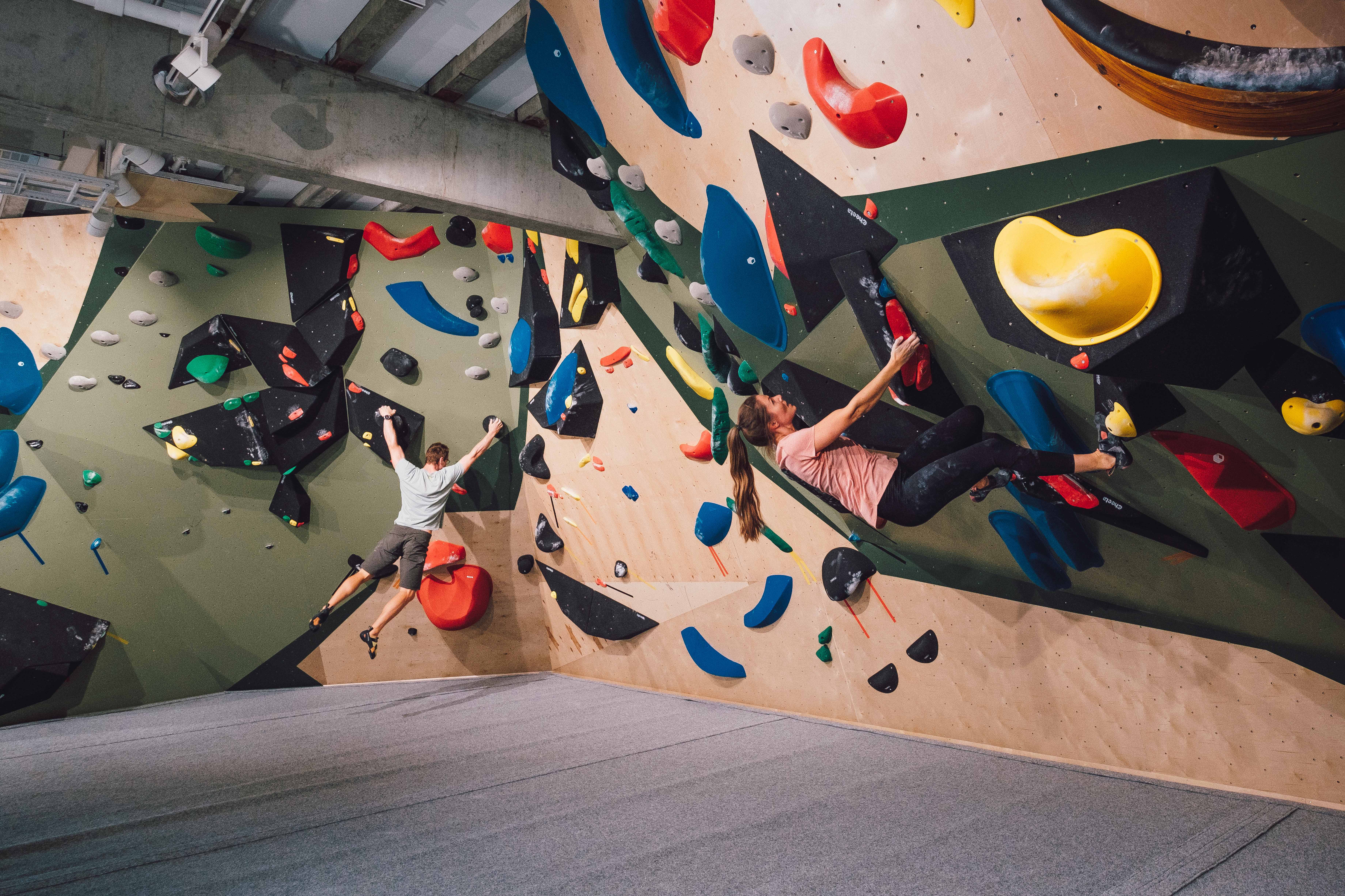 Girl and boy in the climbing wall