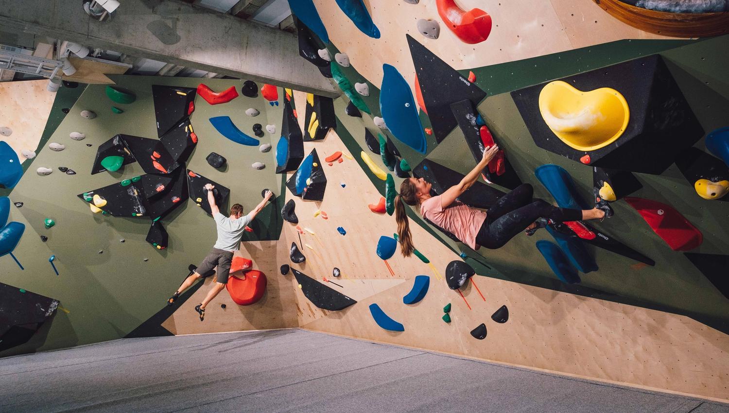 Girl and boy in the climbing wall