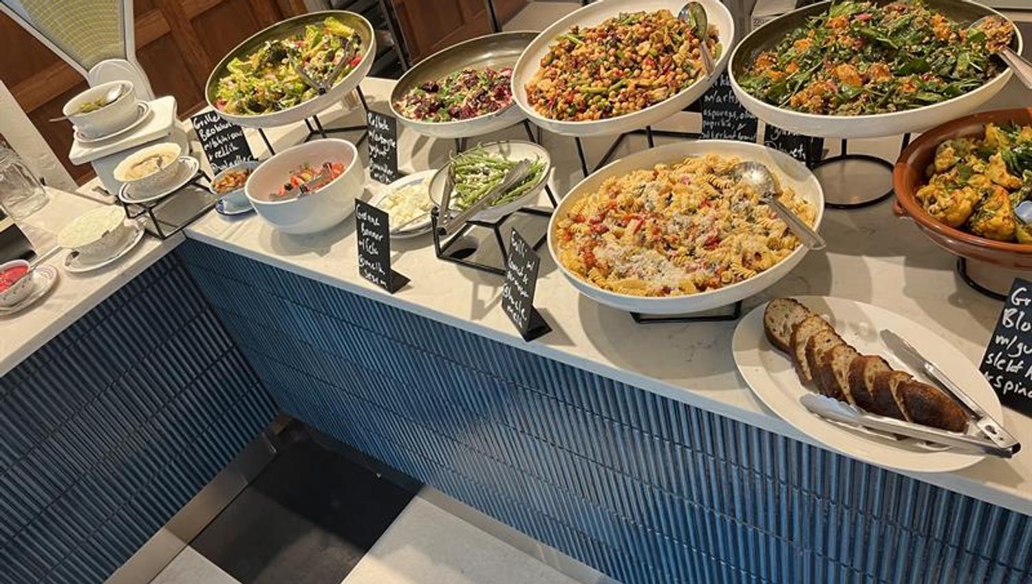 Buffet table with various dishes on