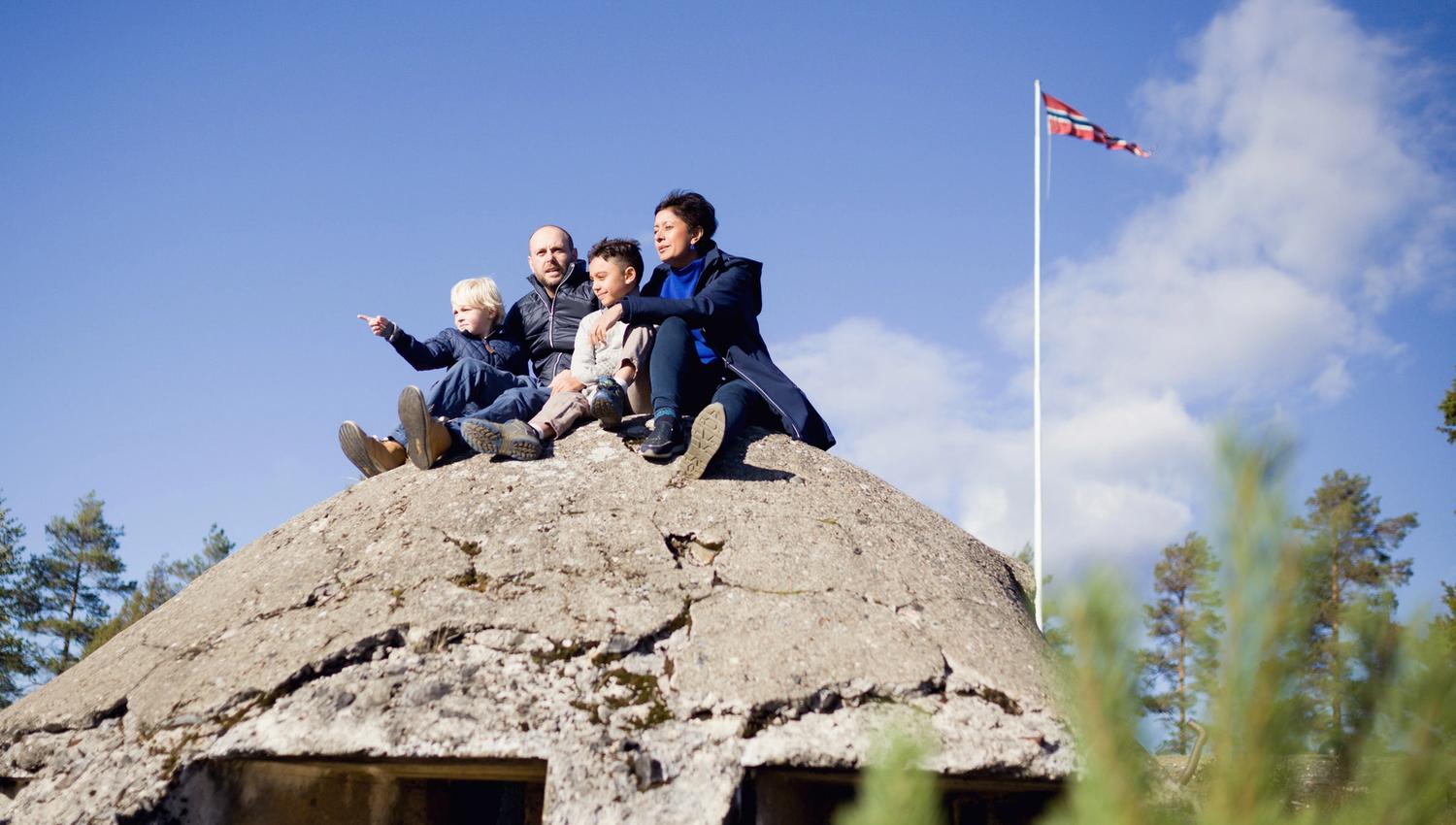 family sitting on the fort