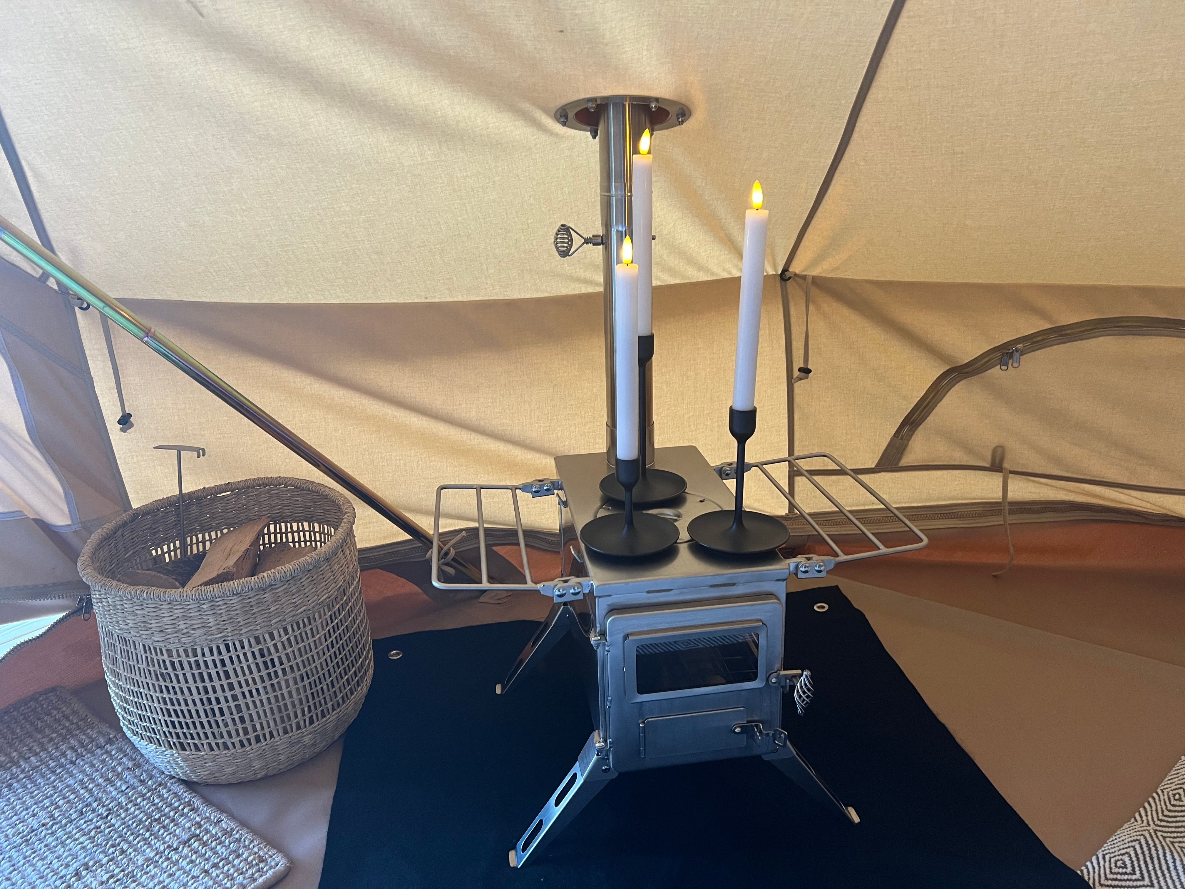 Wood-burning stove in the tent