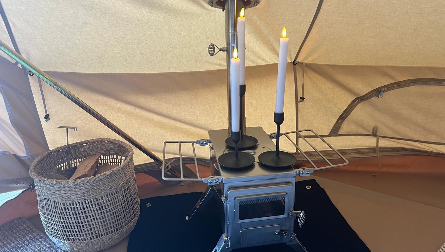 Wood-burning stove in the tent