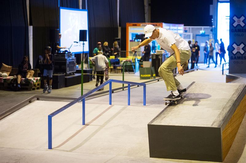 a man on a ramp with a skateboard 