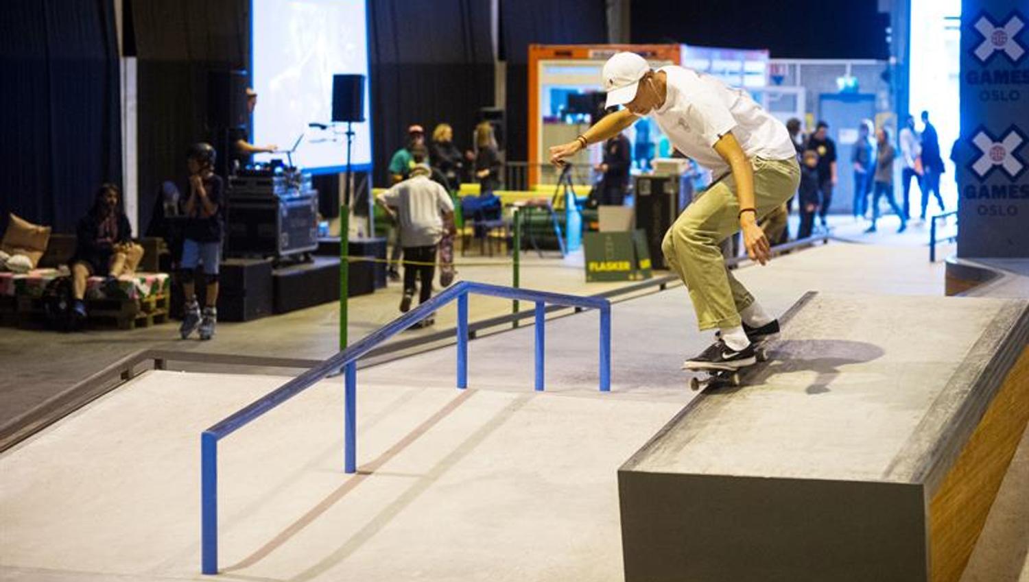 a man on a ramp with a skateboard