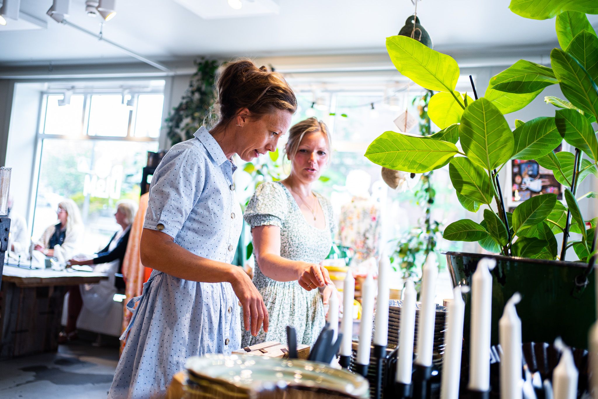two women looking at products