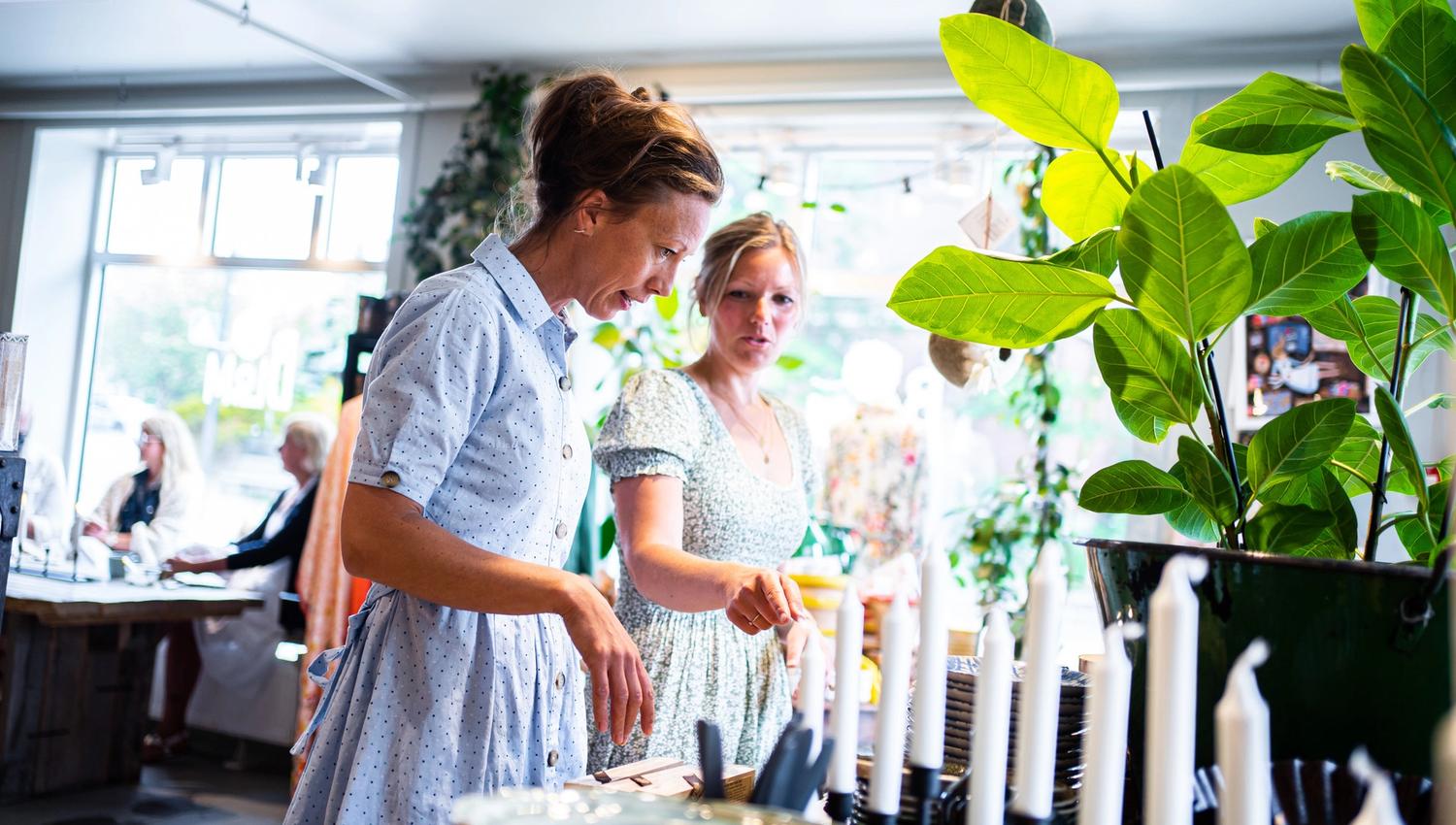two women looking at products