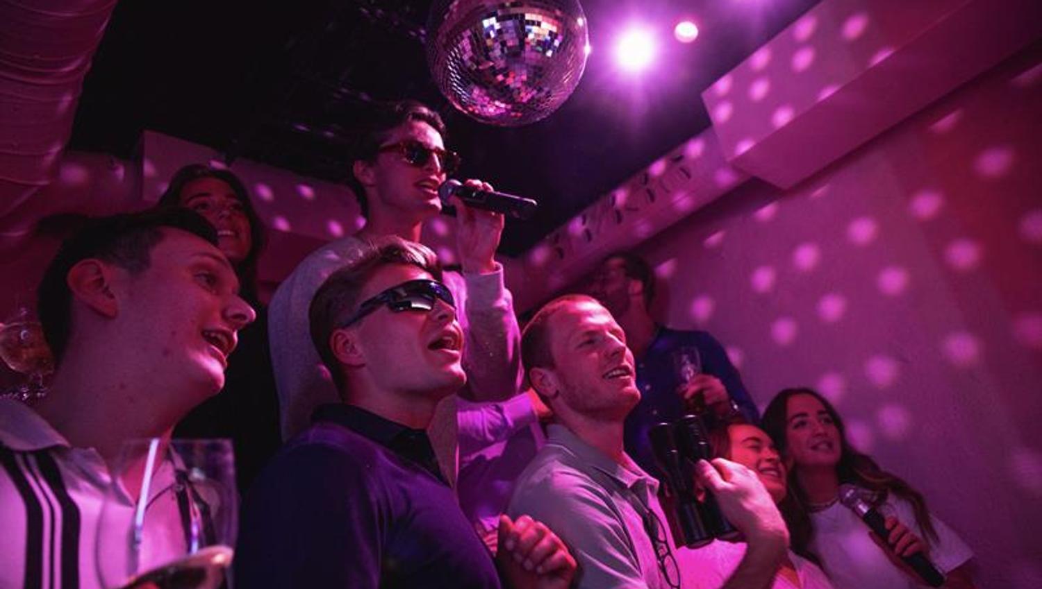 people singing karaoke