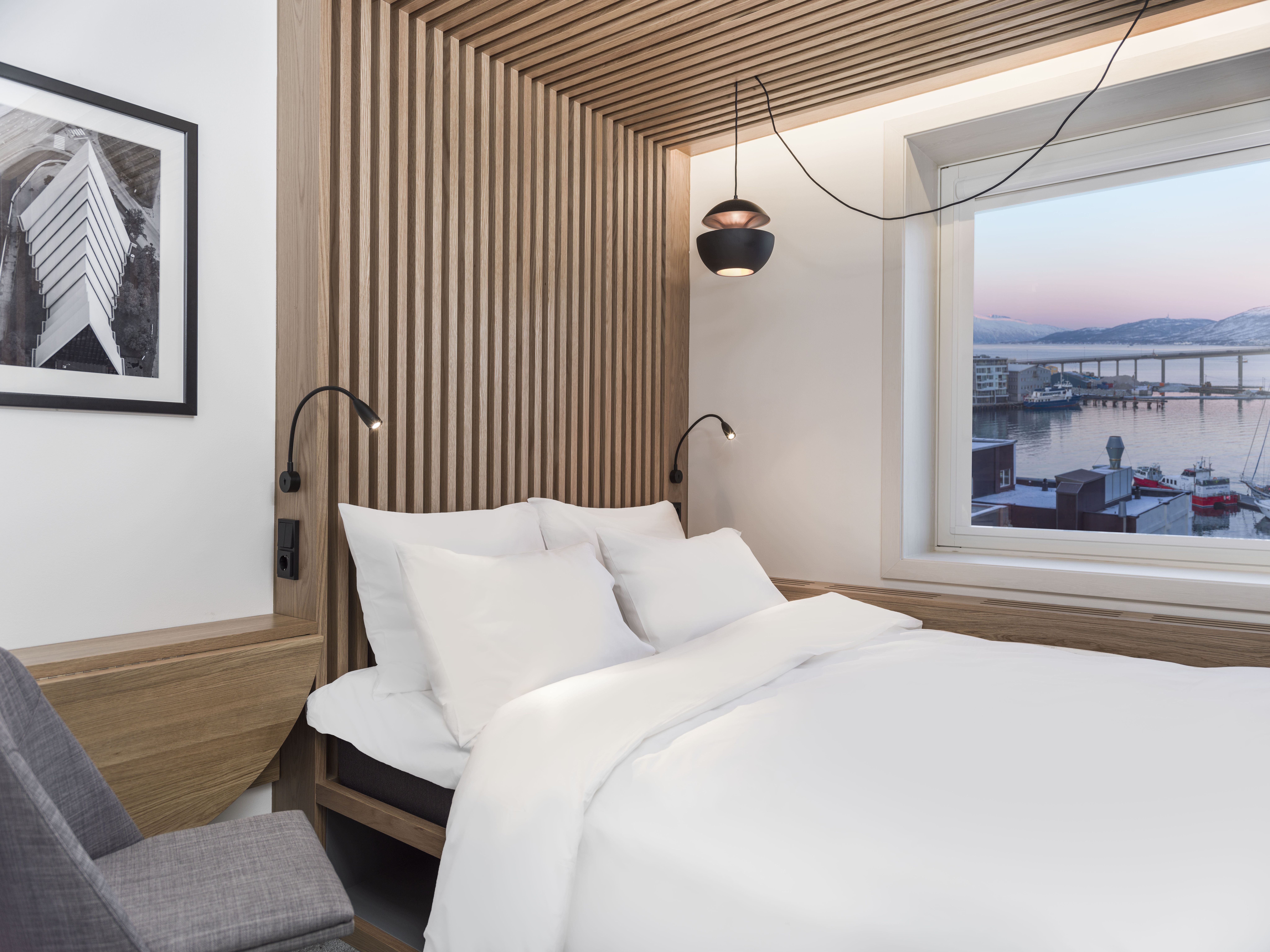 a room with a view and a bed