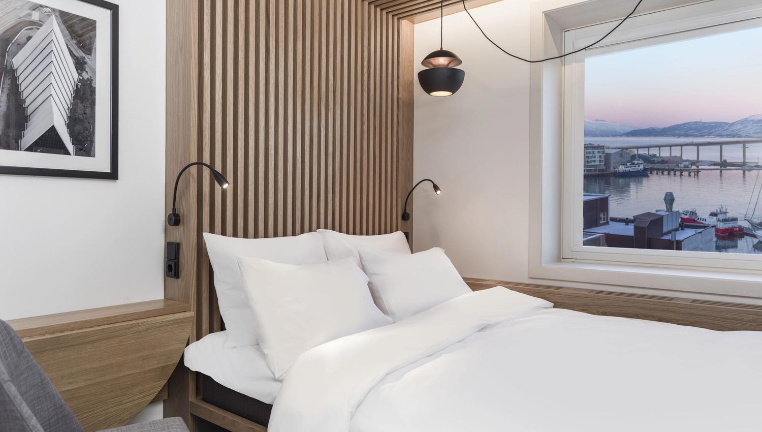a room with a view and a bed