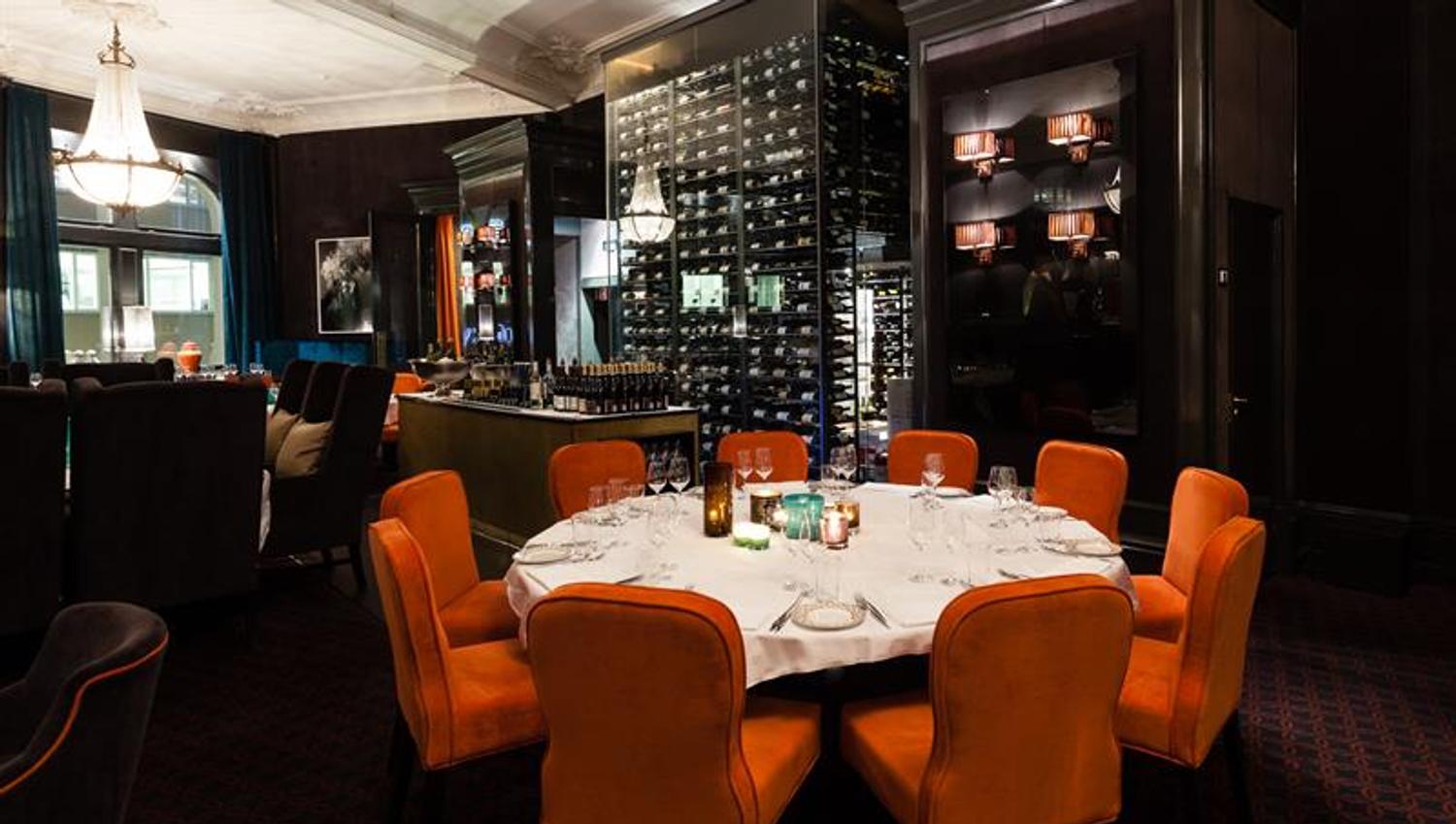 interior of the restaurant with wine cabinet in the background