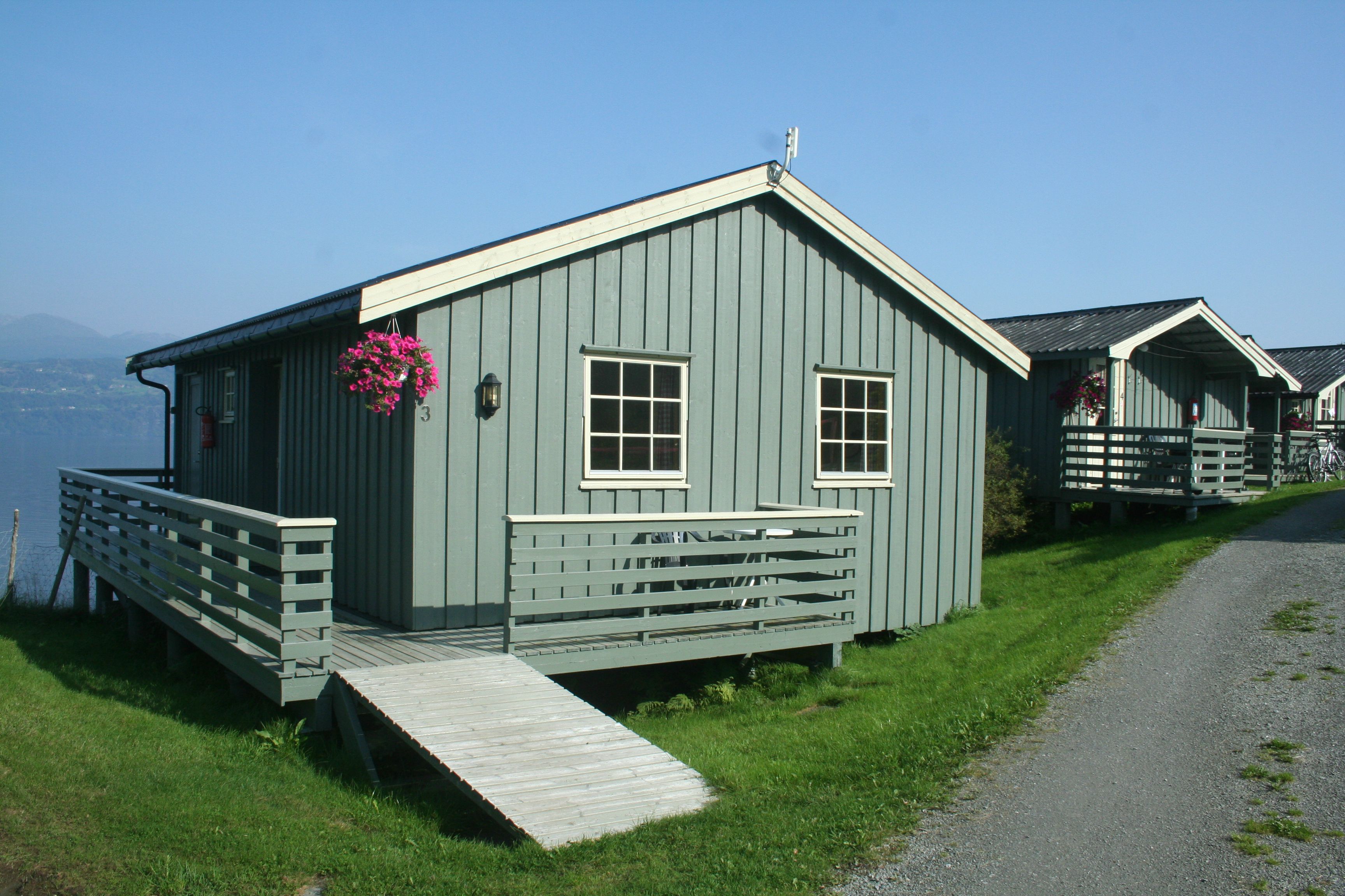 Large family cabin with terrace and fjord view at Oddland Camping in Hardanger.