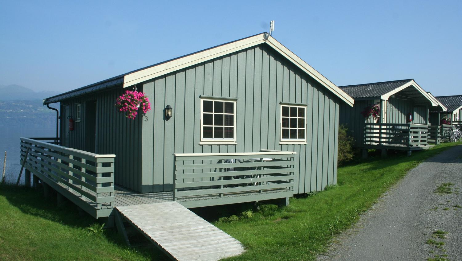 Large family cabin with terrace and fjord view at Oddland Camping in Hardanger.