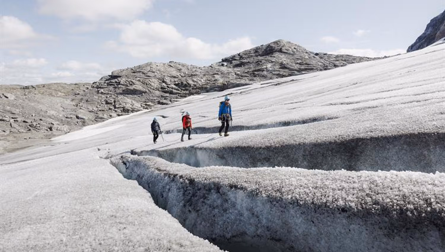 people walk on glacier
