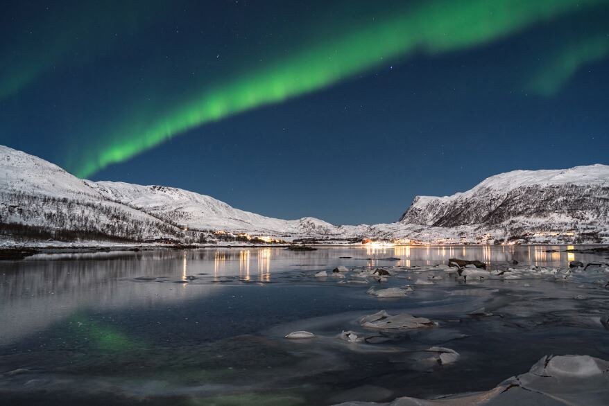 Northern lights, sea and mountains in the Tromso region