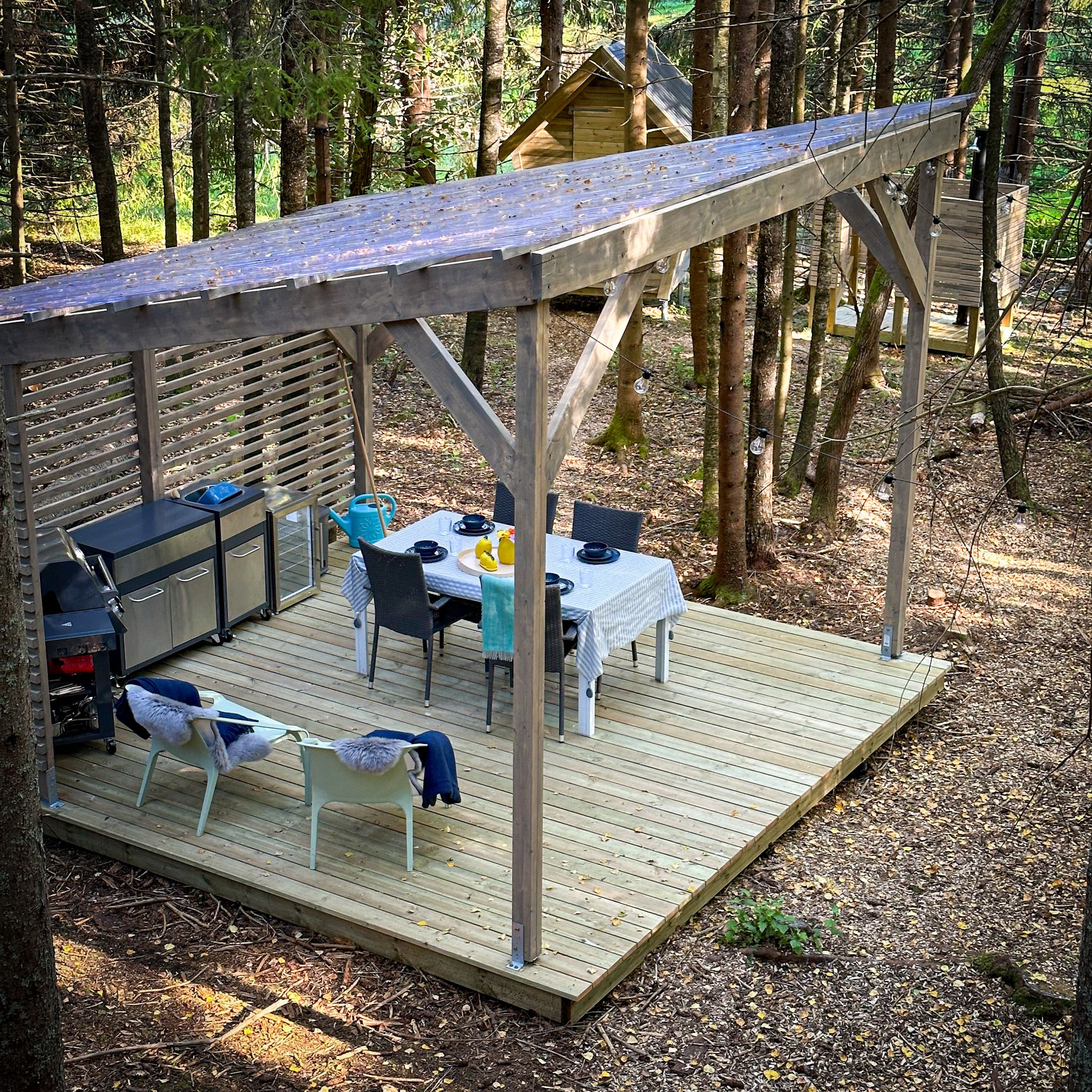 Nice seating area outside with a roof