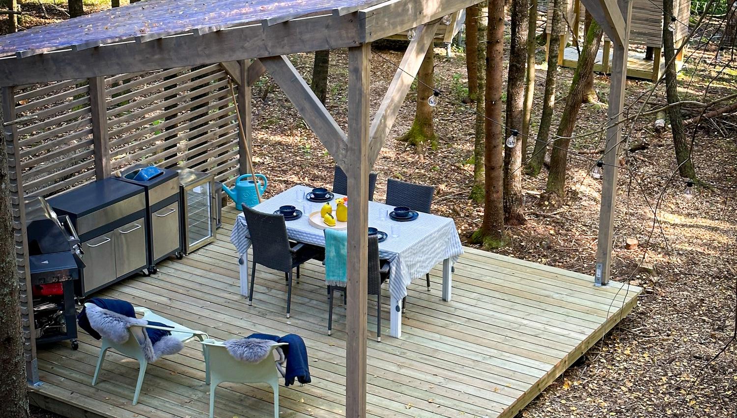 Nice seating area outside with a roof