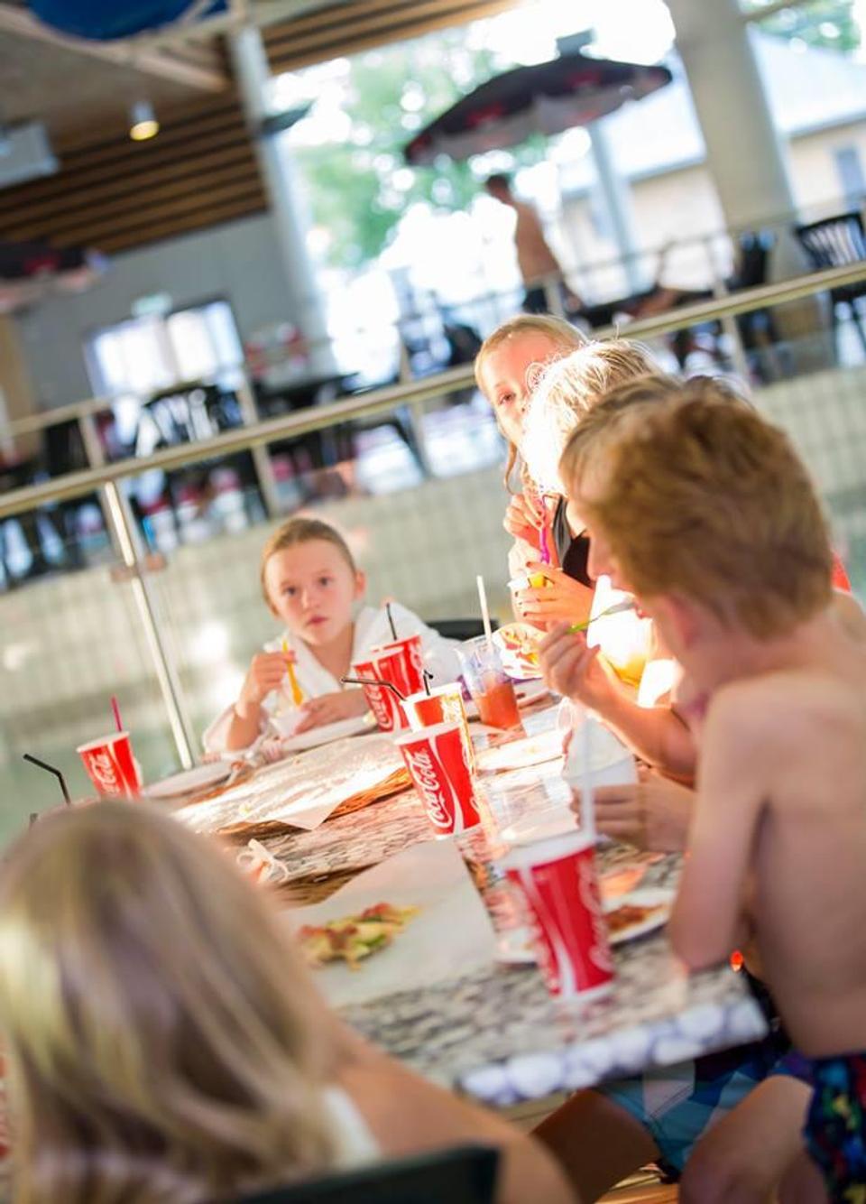 Children eating and drinking