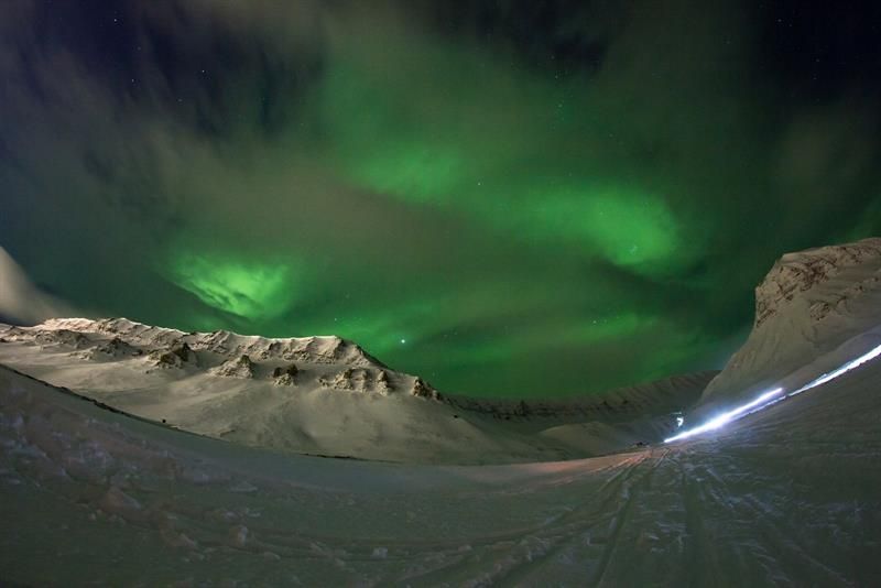 Northern Lights behind clouds