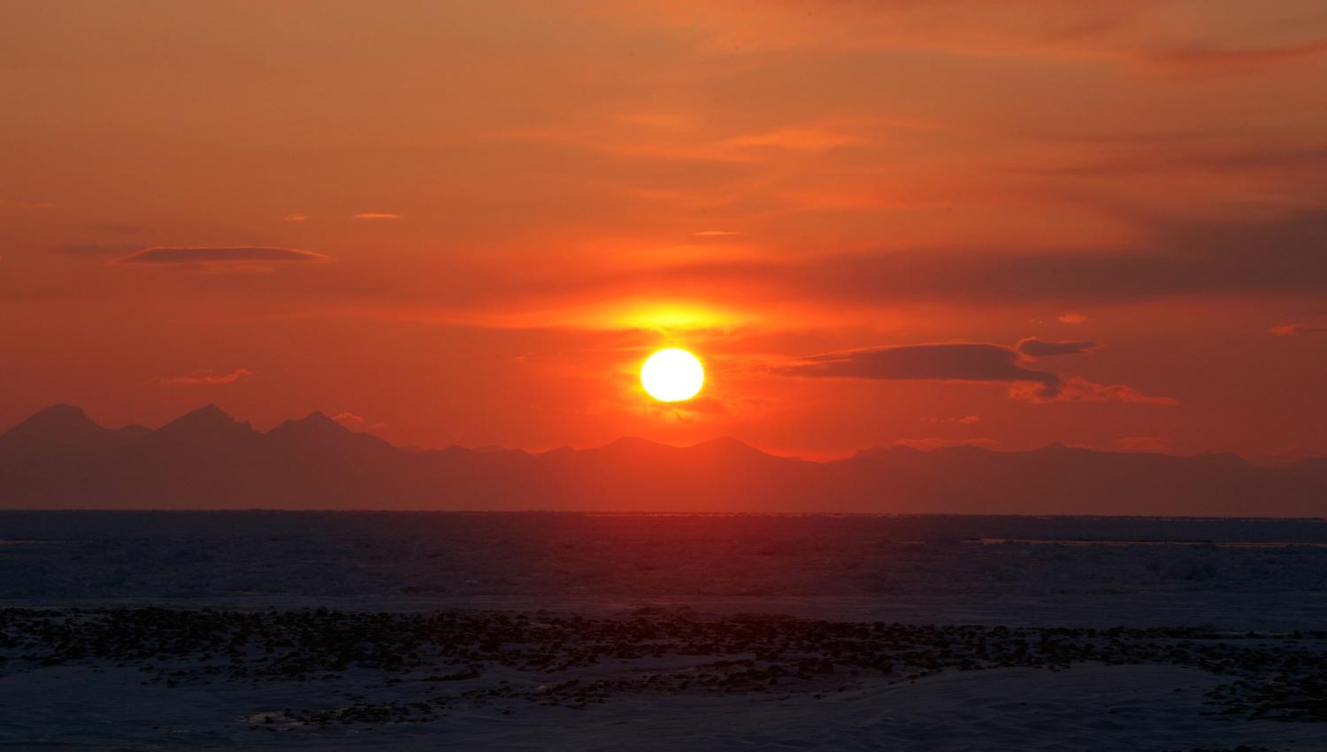 Midnight sun and red sky on Svalbard