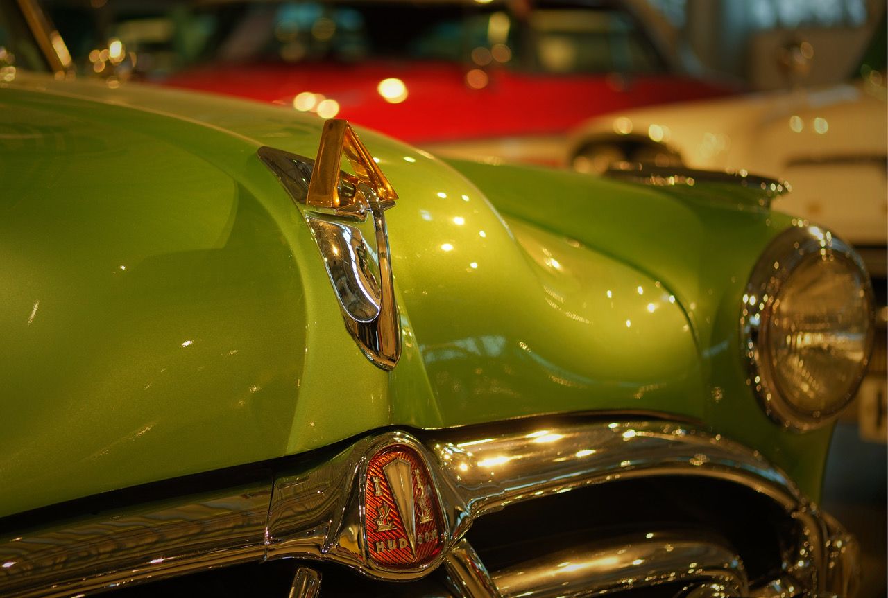 the front of a green old car