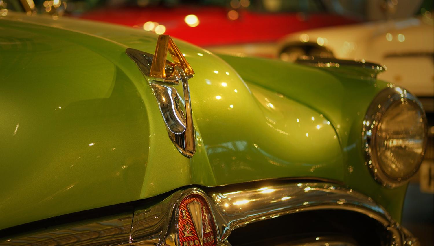 the front of a green old car