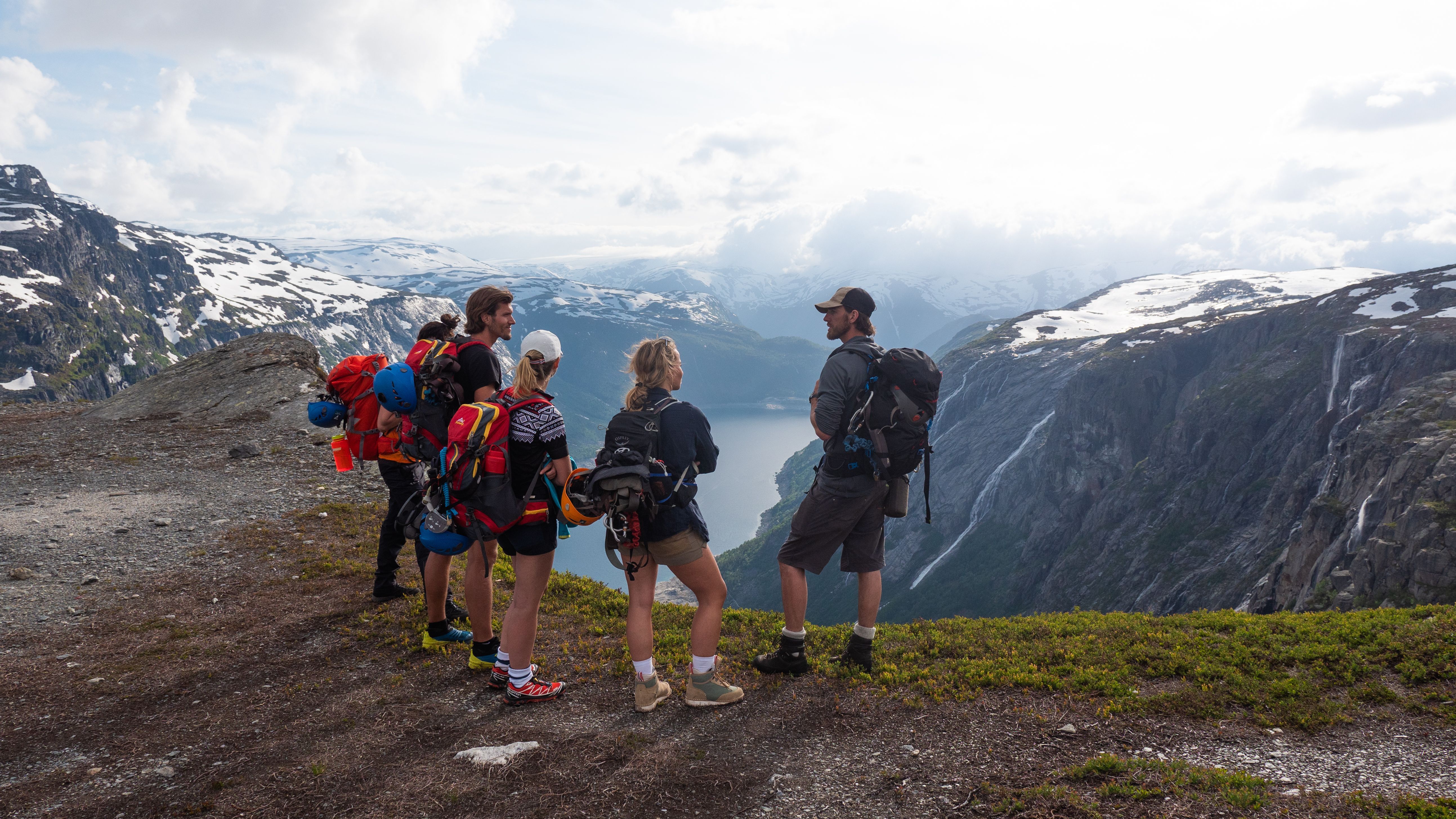A group of people on a guided hike to Trolltunga. 