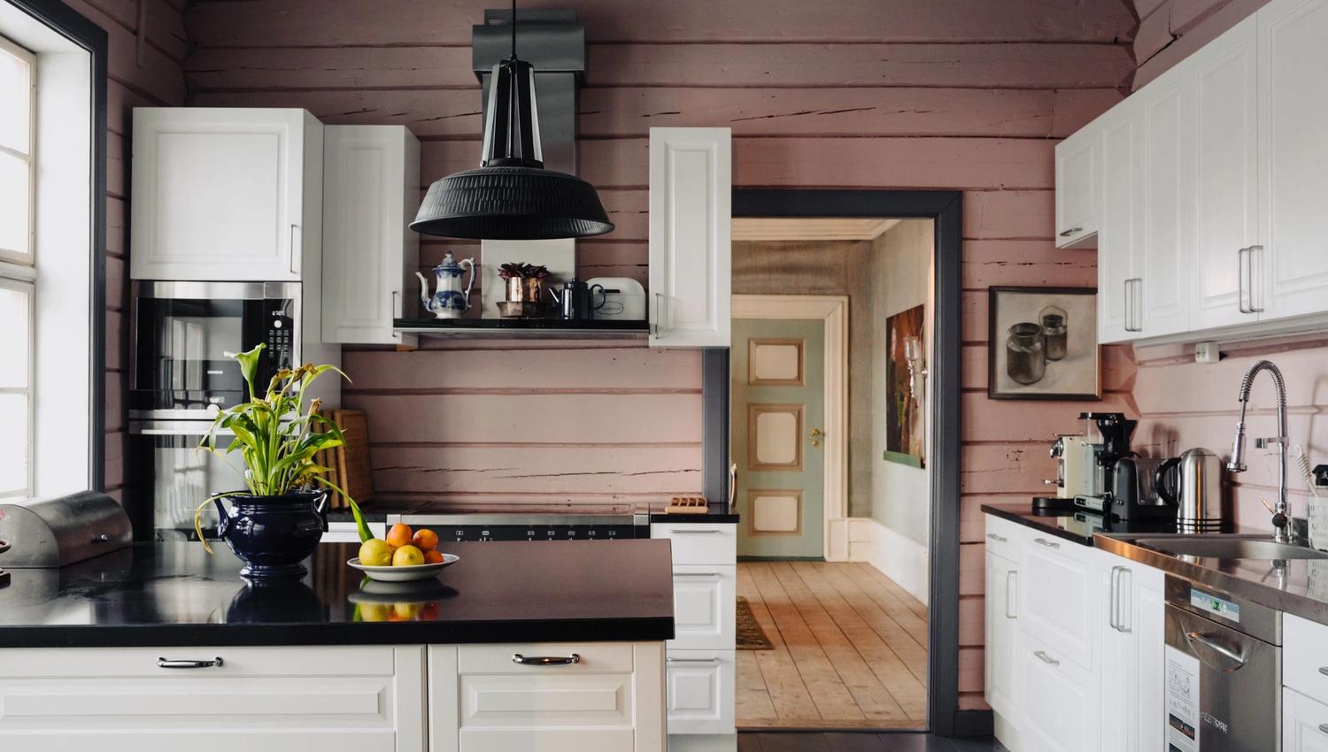 The modern and well-equipped kitchen at Skrivergaarden combines contemporary facilities with the historic character of the building.