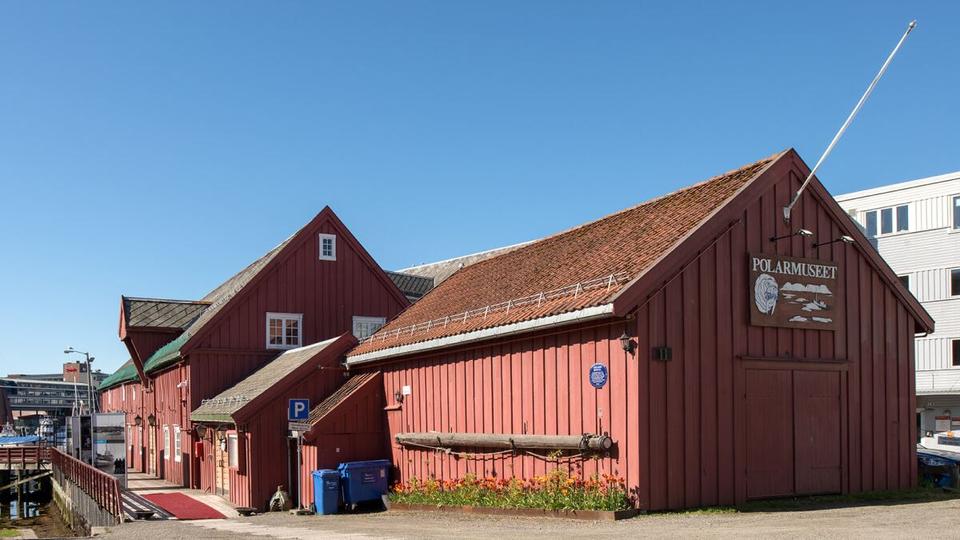 The historic Polar Museum building by the harbour in Tromsø city centre.