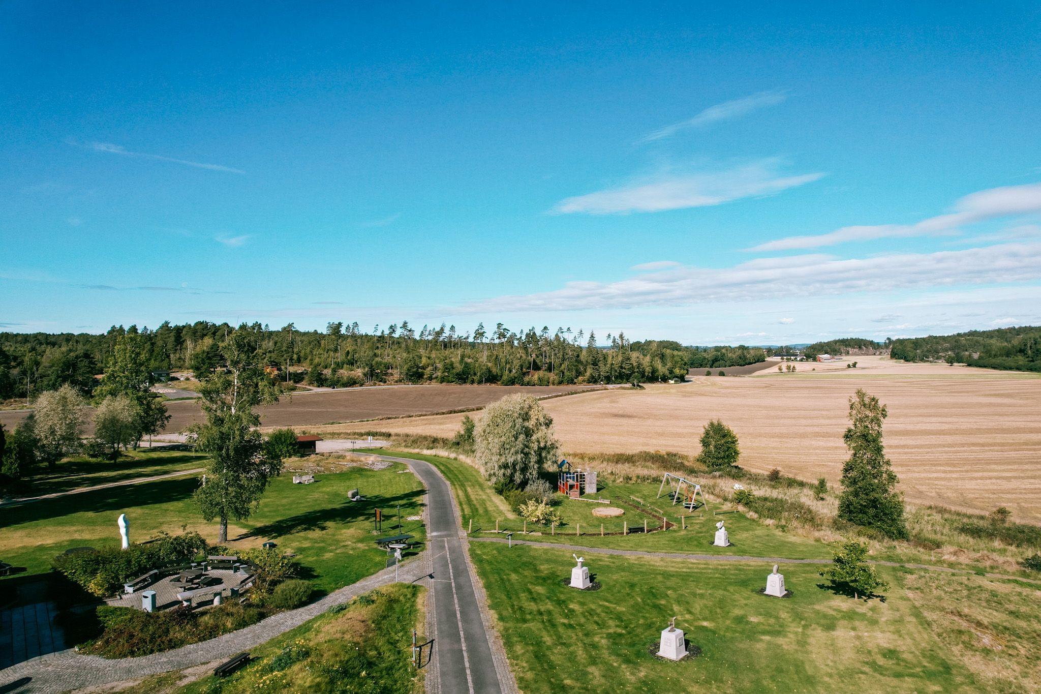 Drone image of the facility at Storedal Cultural Center and the surrounding fields. Photo.