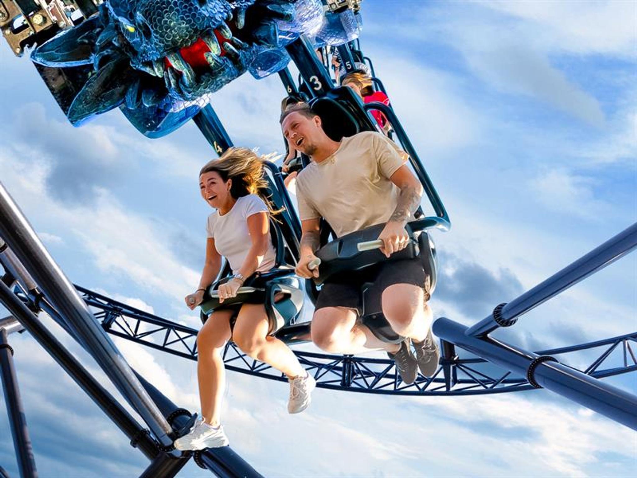 Couple riding the Storm ride
