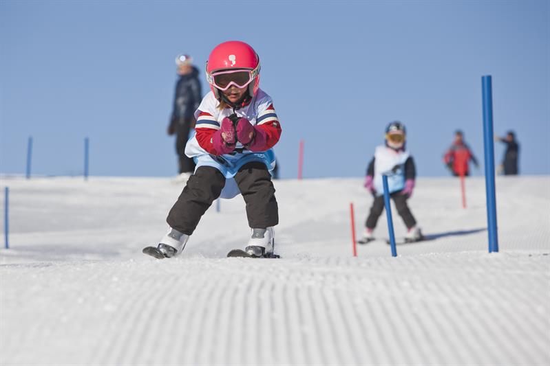 child in the ski school