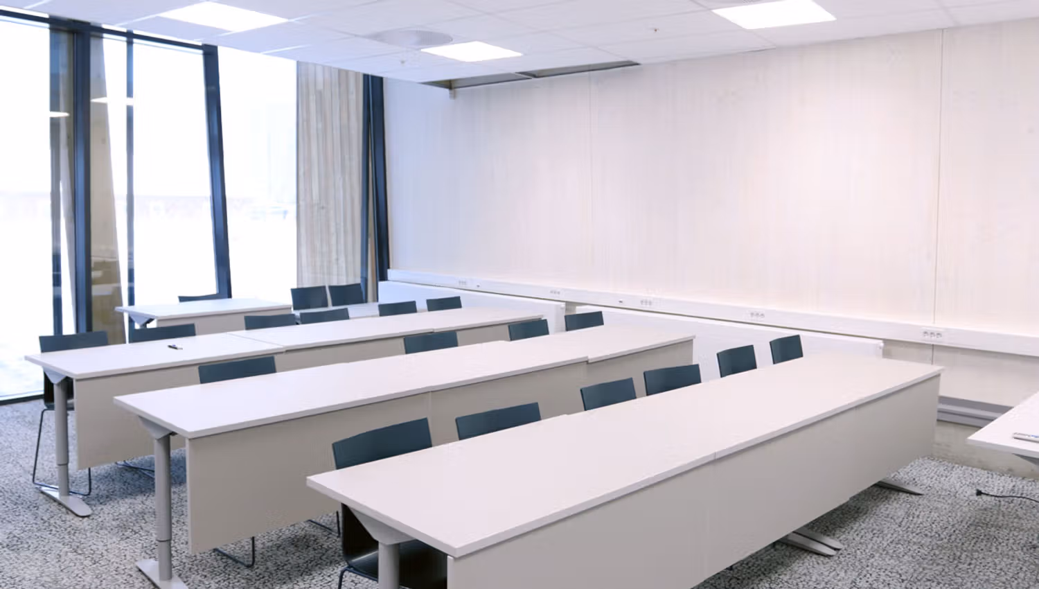 Meeting room with table and chairs