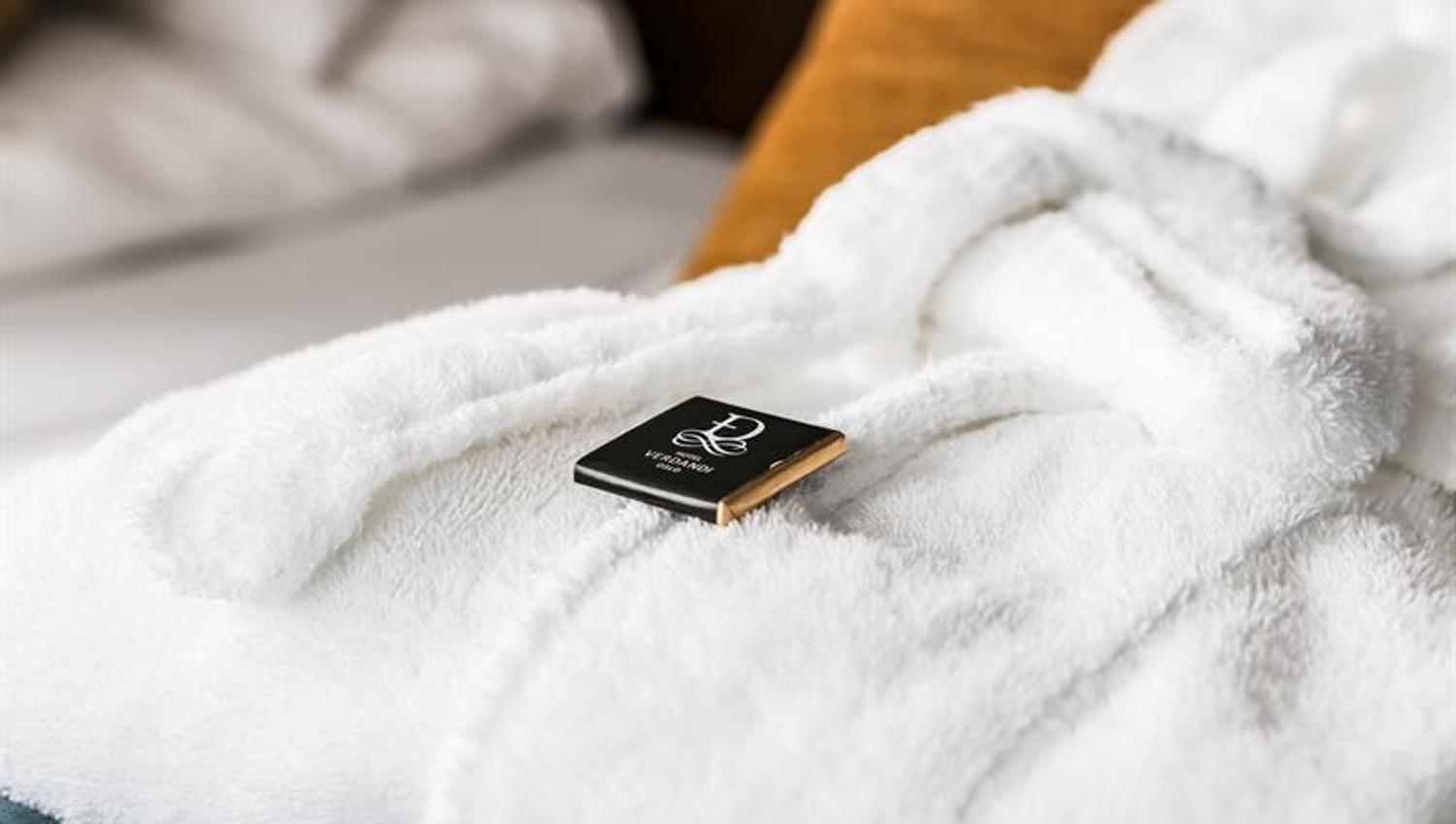 details: chocolate on a folded bathrobe