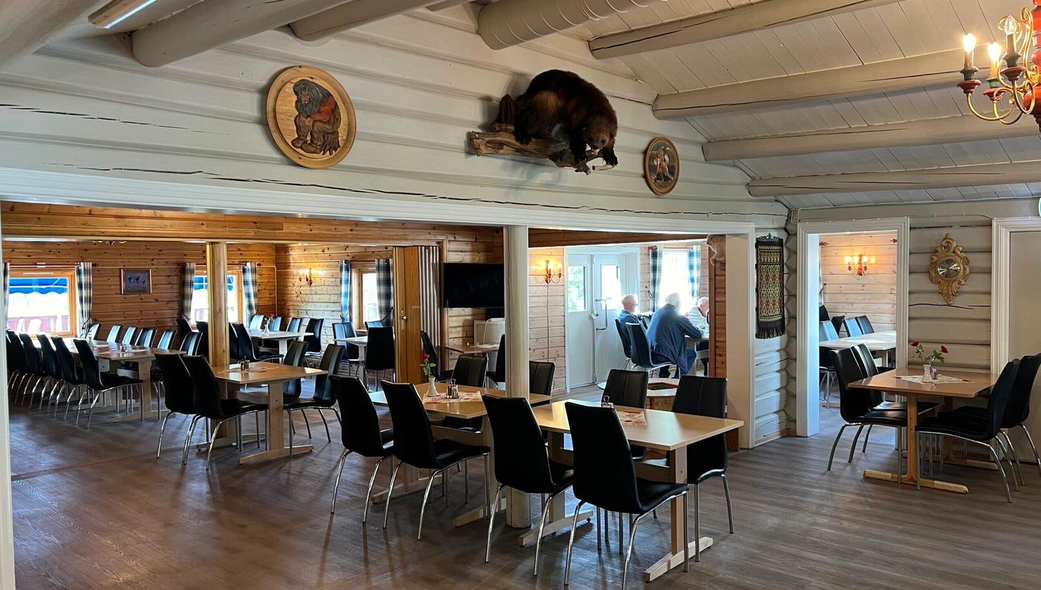 Innendørs bildet av sitteplasser hos Bimbo Veikro