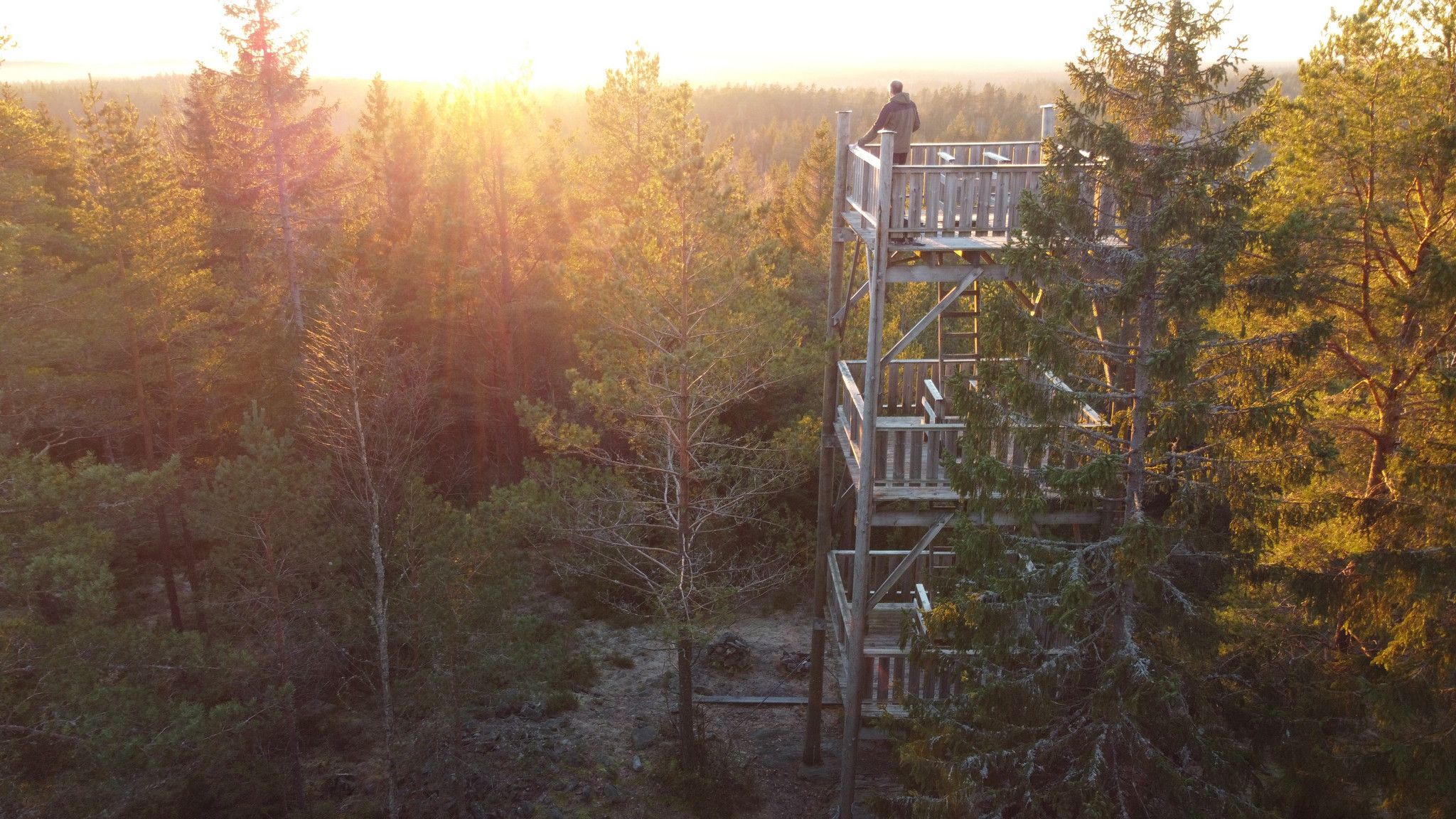 A visitor standing on the top of the tower