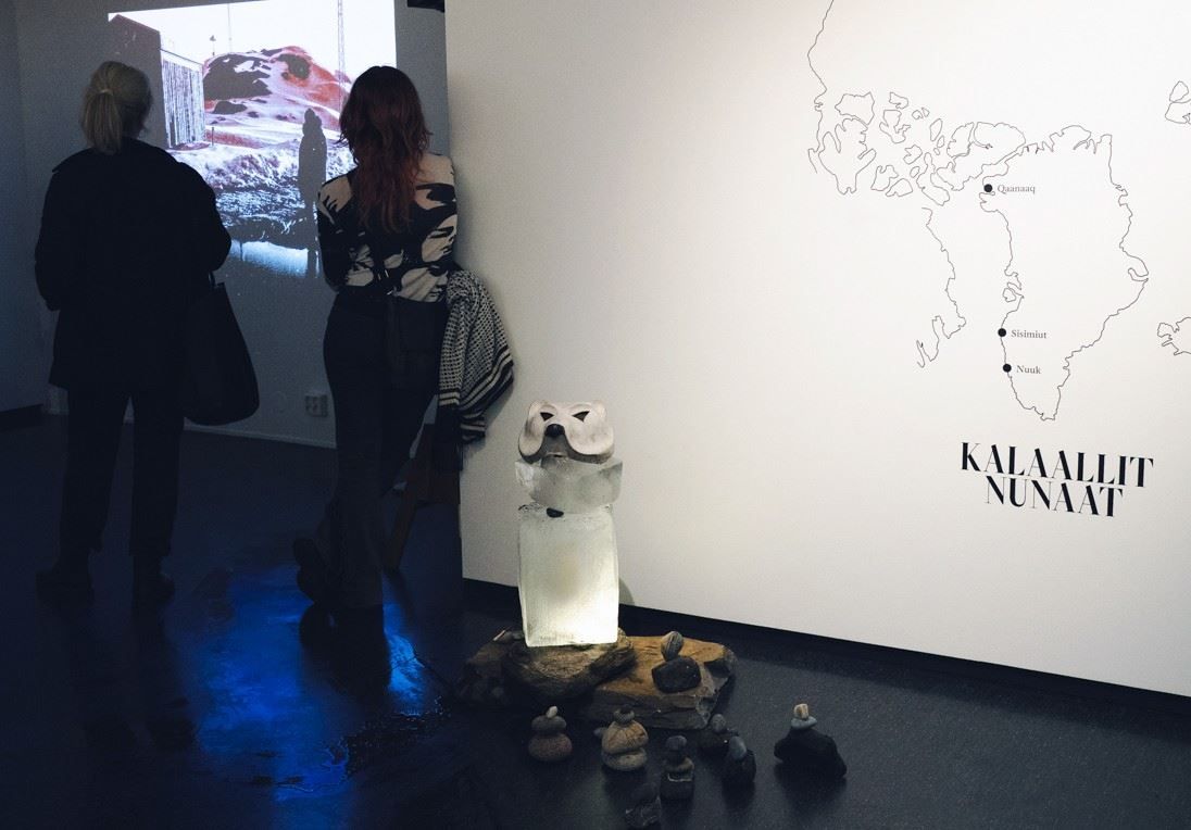 People looking at exhibition