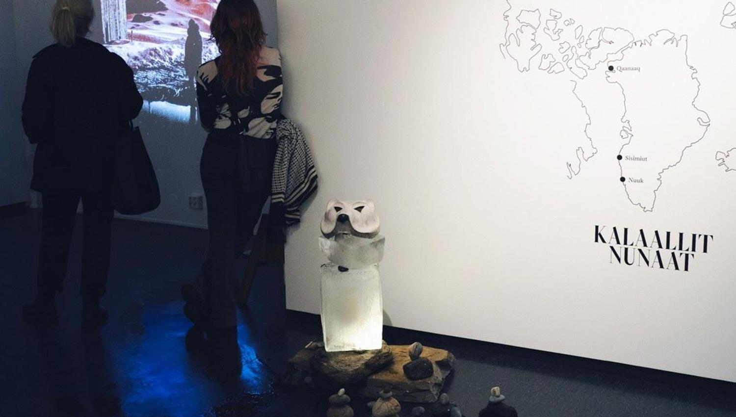 People looking at exhibition