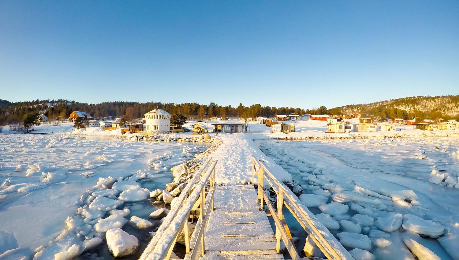 icy pier in sunshine