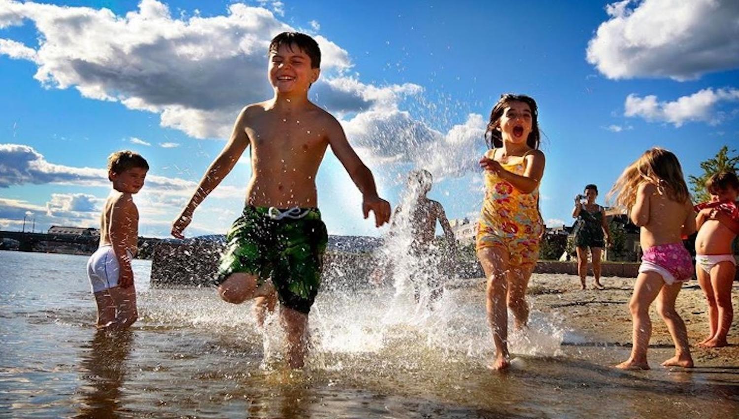 children bathing at Bystranda