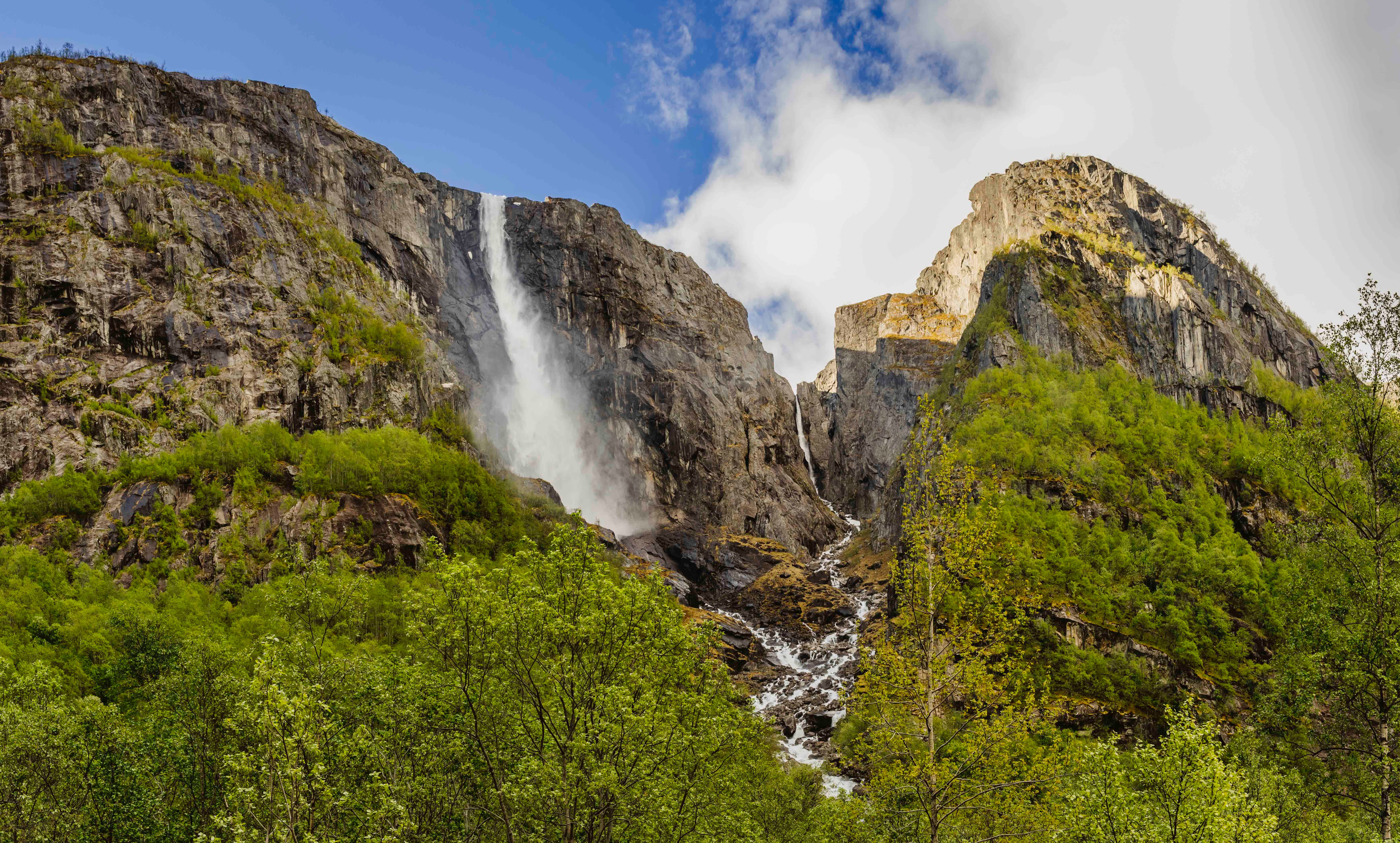 Skytjefossen waterfall seen from below.