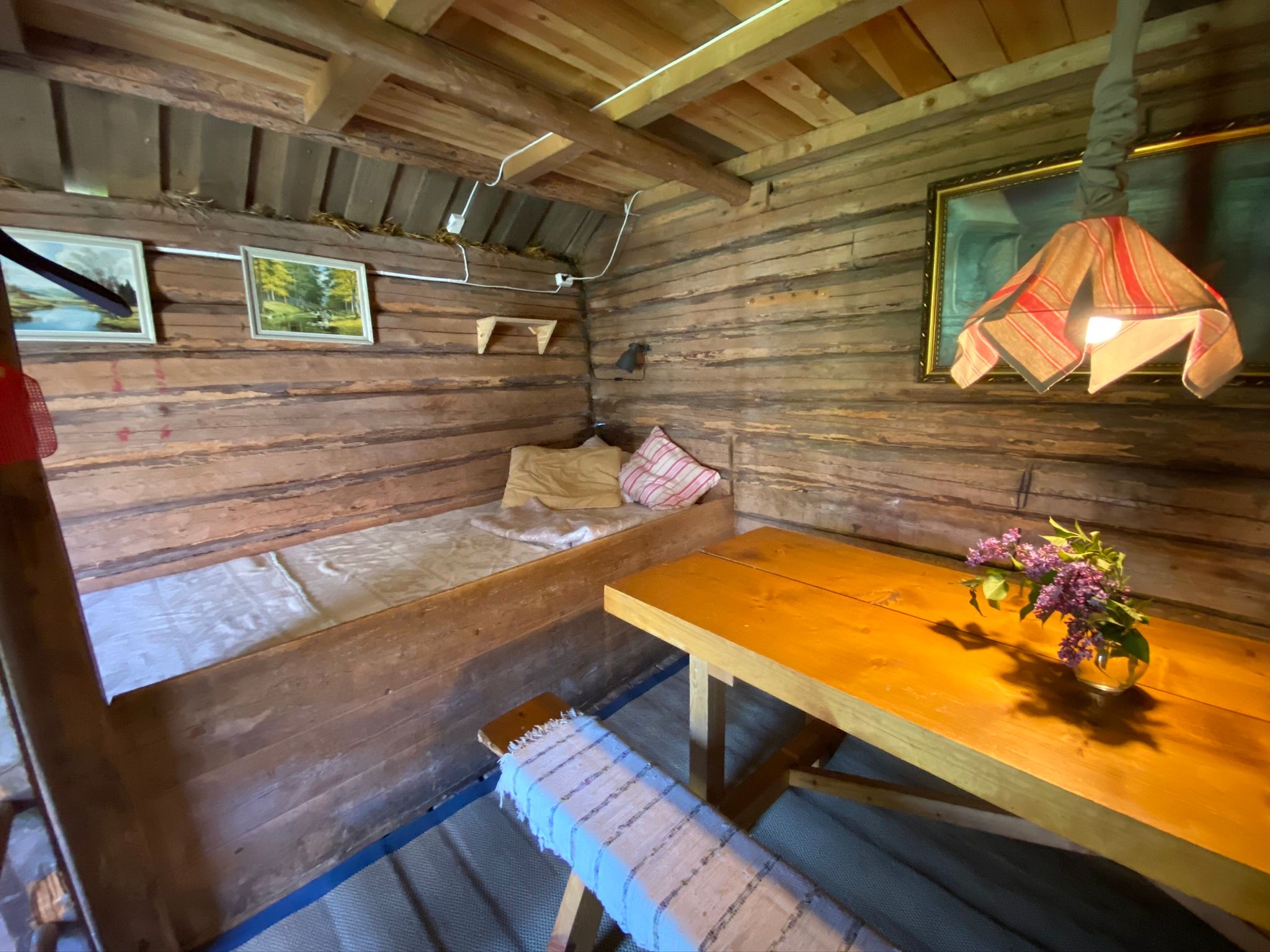 old livingroom with a bench and bed
